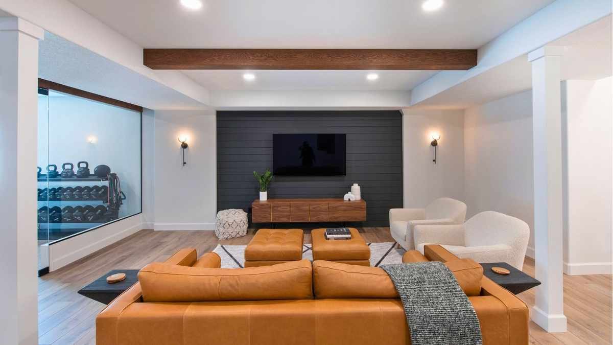A stylish basement equipped for entertainment and leisure.