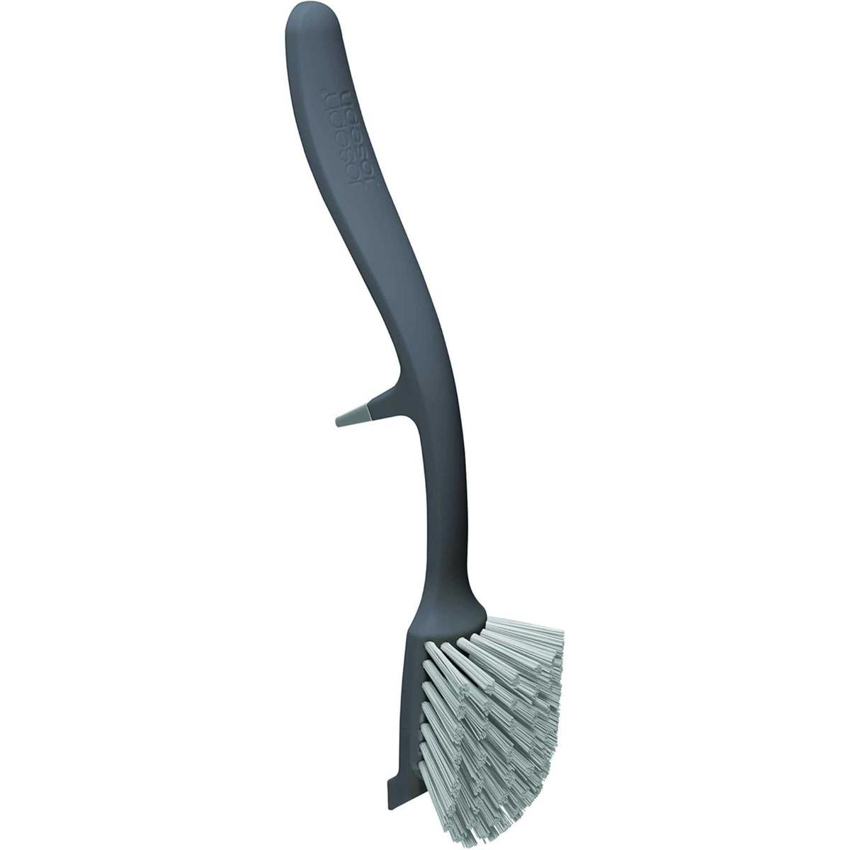 A dark blue Joseph Joseph dish brush