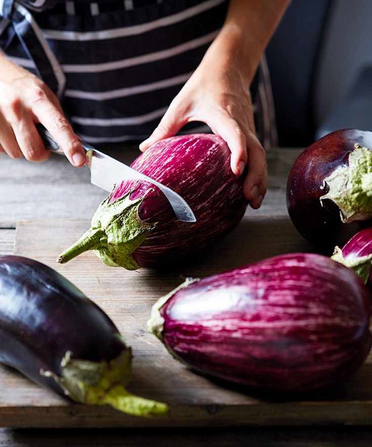 cutting an eggplant