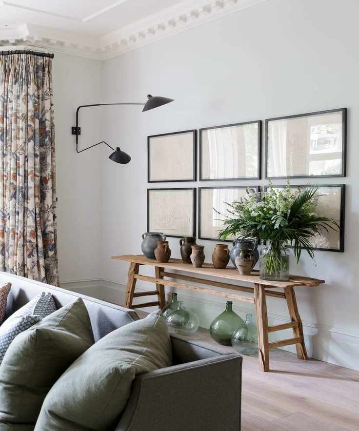 Neutral living room with art display